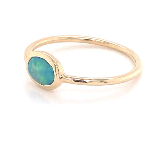 Ægte solid crystal opal fra Australien indfattet i 14 karat guld.