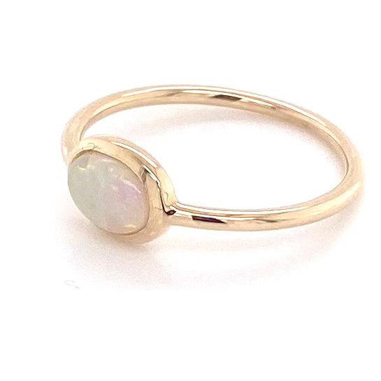 Ægte solid crystal opal fra Australien indfattet i 14 karat guld.