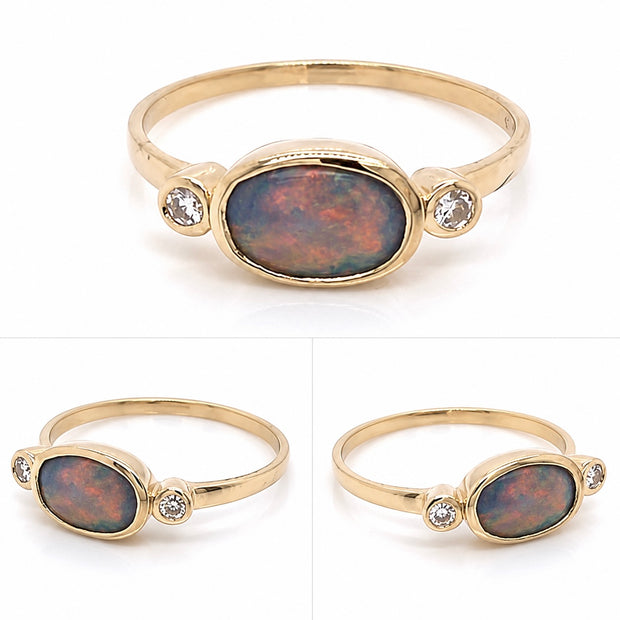 Ring med en ægte solid opal fra vores egen mine i Lightning Ridge, Australien. Indfattet i blankt 14 karat guld. Opalen vejer 0,79 ct., og der er isat 2x 0,03 ct. W/SI diamanter.