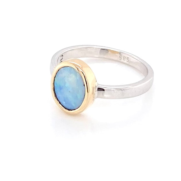 Ægte solid krystal opal fra Australien indfattet i 14 kt. guld og sterling sølv.