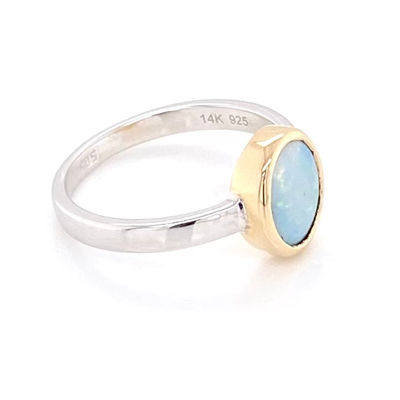 Ægte solid krystal opal fra Australien indfattet i 14 kt. guld og sterling sølv.