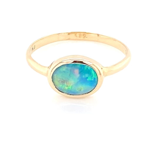 Ring med ægte solid crystal opal fra Australien indfattet i 14 kt. guld.Kommer med certifikat. 