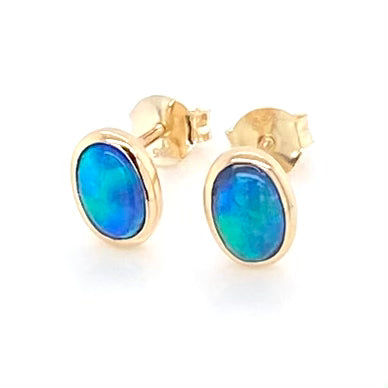Ægte solide Australske krystal opaler indfattet i 14 karat guld.