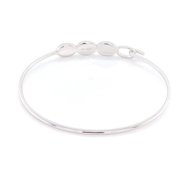 Armbånd i Sterling sølv med 3 doublet opaler der sidder oven på armen. Underside af armringen.