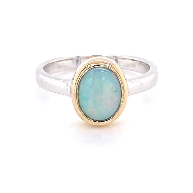 Ægte solid crystal opal fra Australien indfattet i 14 kt. guld og sterling sølv.