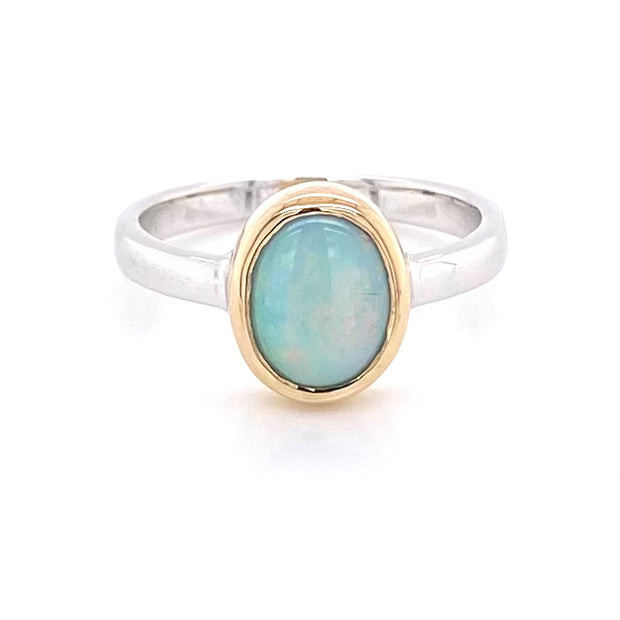 Ægte solid crystal opal fra Australien indfattet i 14 kt. guld og sterling sølv.