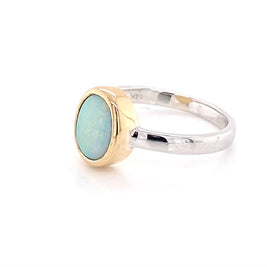 Ægte solid crystal opal fra Australien indfattet i 14 kt. guld og sterling sølv.