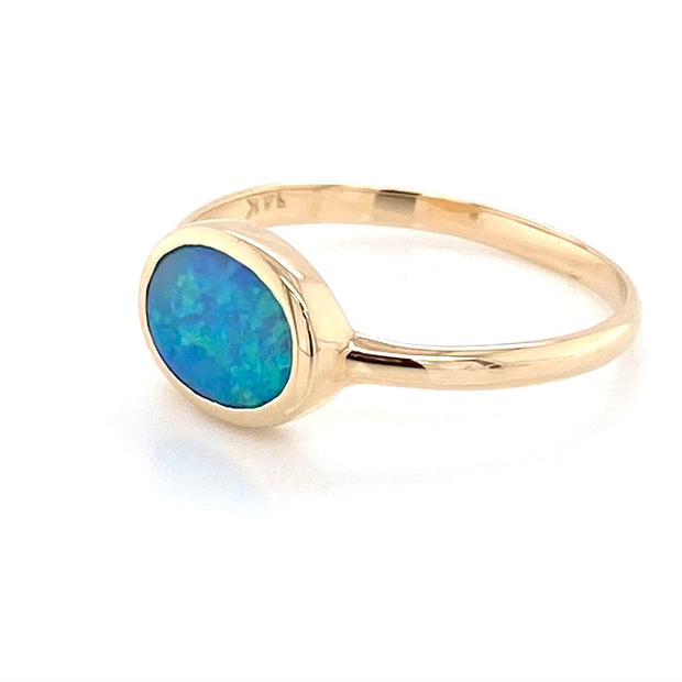 Ring med ægte solid crystal opal fra Australien indfattet i 14 Kt. guld. Kommer med certifikat.