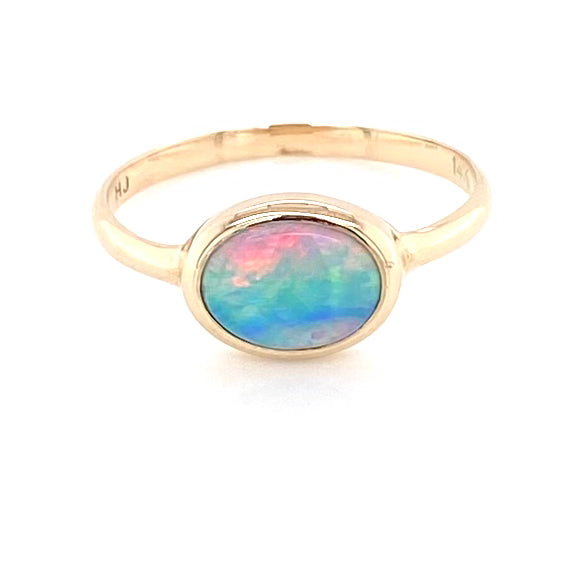 Ring med ægte solid crystal opal fra Australien indfattet i 14 kt. guld. Kommer med certifikat. 