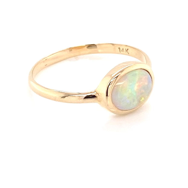Ægte solid crystal opal fra Australien indfattet i 14 kt. guld. Kommer med oprindelses certifikat.
