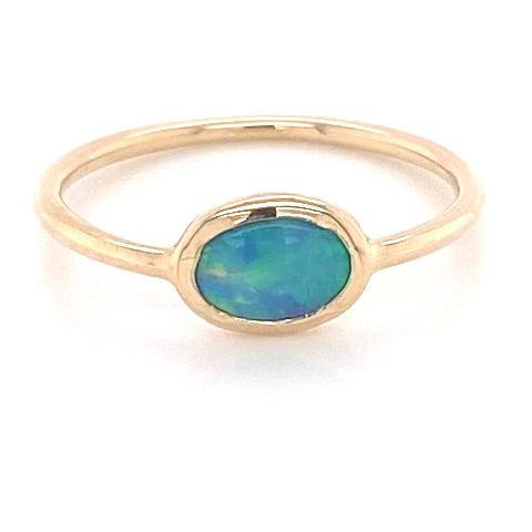 Ægte solid crystal opal fra Australien indfattet i 14 karat guld.