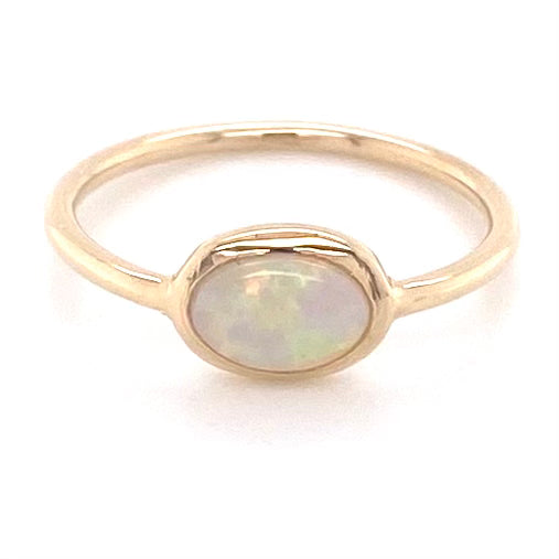 Ægte solid crystal opal fra Australien indfattet i 14 karat guld.