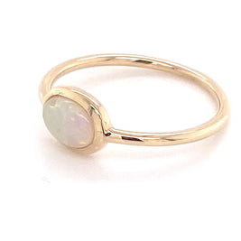 Ægte solid crystal opal fra Australien indfattet i 14 karat guld.