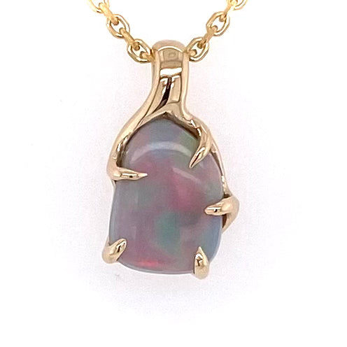 Vedhæng med en ægte solid opal fra vores mine i Lightning Ridge, Australien indfattet i 14 karat guld. Opalen er 1,76 ct, og bodytone er N6/N7.