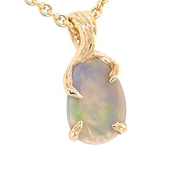 Ægte solid krystal opal fra vores egen mine i Lightning Ridge, Australien indfattet i 14 karat rustikt guld. De krogede grene af 14 karat guld holder opalen på plads.