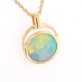 Vedhæng med en ægte solid krystal opal fra Australien indfattet i 14 karat guld. Opalen vejer 1,18 ct.
