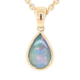 Vedhæng med en ægte solid krystal opal fra Australien indfattet i 14 karat guld.
