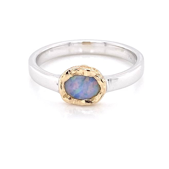 Ægte solid crystal opal fra Australien indfattet i 14 karat guld og sterling sølv.