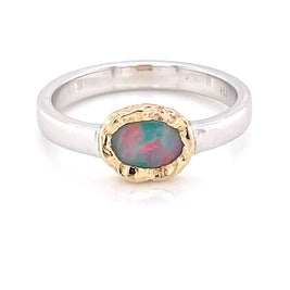 Ægte solid crystal opal fra Australien indfattet i 14 karat guld og sterling sølv.