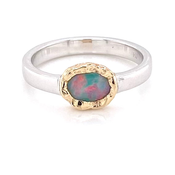 Ægte solid crystal opal fra Australien indfattet i 14 karat guld og sterling sølv.