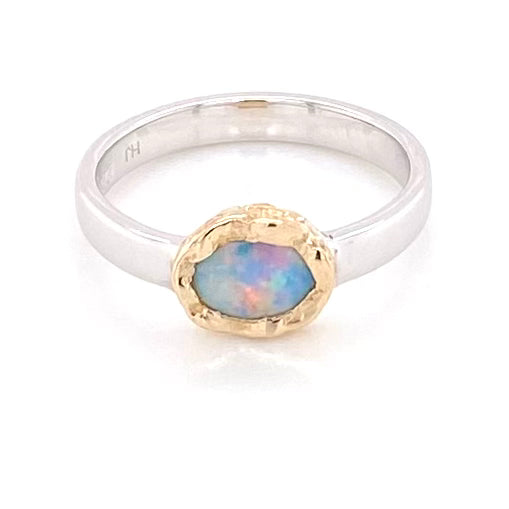 Ægte solid crystal opal fra Australien indfattet i 14 karat guld og sterling sølv.