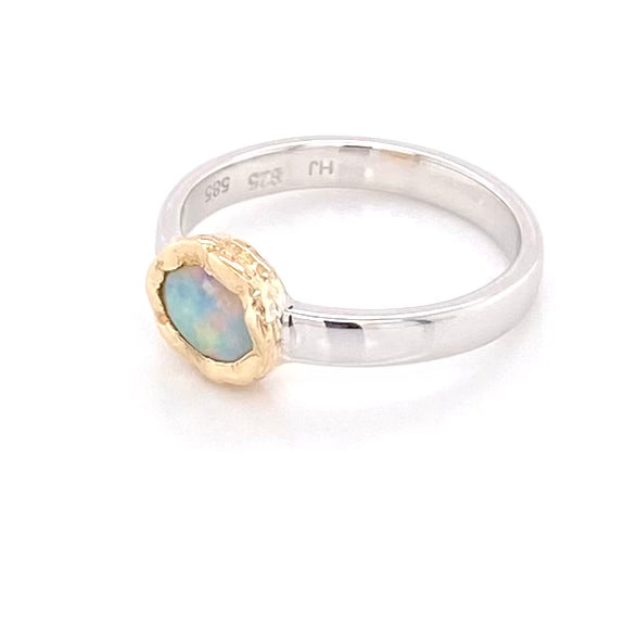 Ægte solid crystal opal fra Australien indfattet i 14 karat guld og sterling sølv.