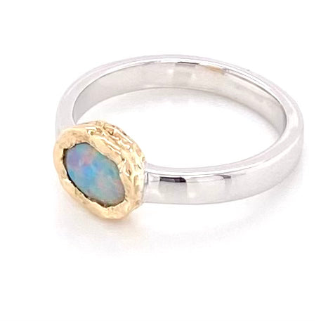 Ægte solid crystal opal fra Australien indfattet i 14 karat guld og sterling sølv.