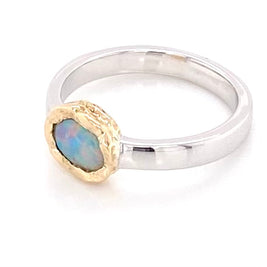 Ægte solid crystal opal fra Australien indfattet i 14 karat guld og sterling sølv.