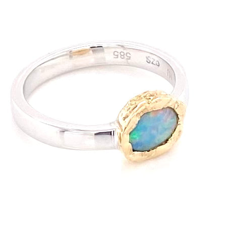Ægte solid crystal opal fra Australien indfattet i 14 karat guld og sterling sølv.