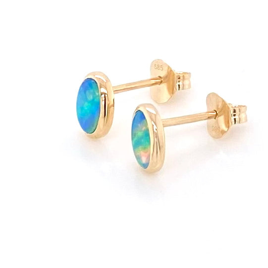 Ørestikker med ægte solide crystal opaler fra Australien indfattet i 14 karat guld.
