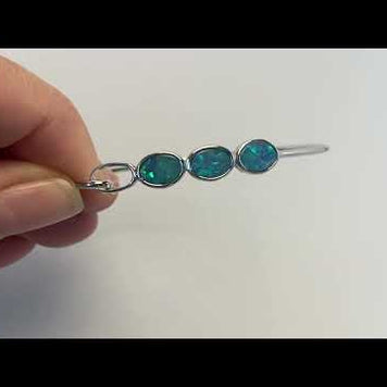 Armring i sterling sølv med 3 stk. 9 x 7 mm ægte doublet opaler fra Australien.