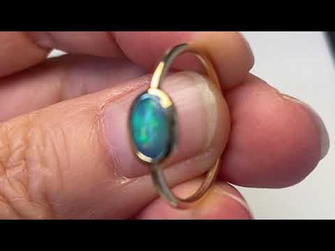 Ægte solid crystal opal fra Australien indfattet i 14 karat guld.