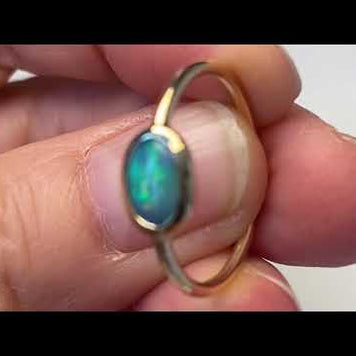 Ægte solid crystal opal fra Australien indfattet i 14 karat guld.