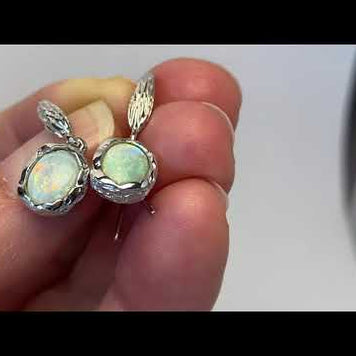 Ørehængere med ægte solide crystal opaler fra Australien, indfattet i sterling sølv.