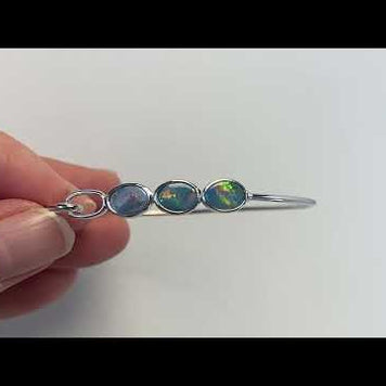 Armring i sterling sølv med 3 stk. 9 x 7 mm ægte doublet opaler fra Australien.