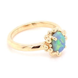 Ring med solid opal fra vores opalmine i Lightning Ridge, Australien udført i 14 karat guld. Kommer med certifikat.