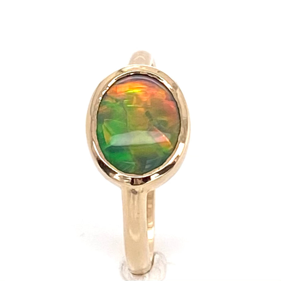 Ring i 14 karat guld med ægte solid  "Fire opal" fra vores opalmine i Lightning Ridge, Australien.