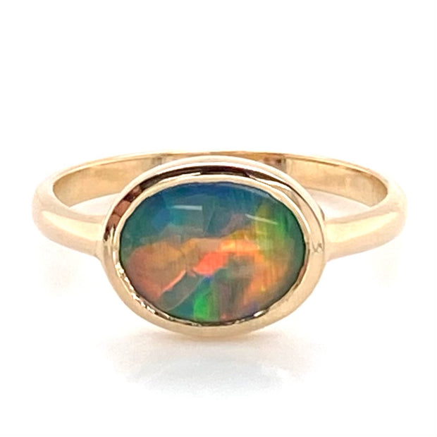 Ring i 14 karat guld med ægte solid  "Fire opal" fra vores opalmine i Lightning Ridge, Australien.