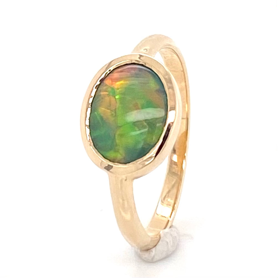 Ring i 14 karat guld med ægte solid  "Fire opal" fra vores opalmine i Lightning Ridge, Australien.